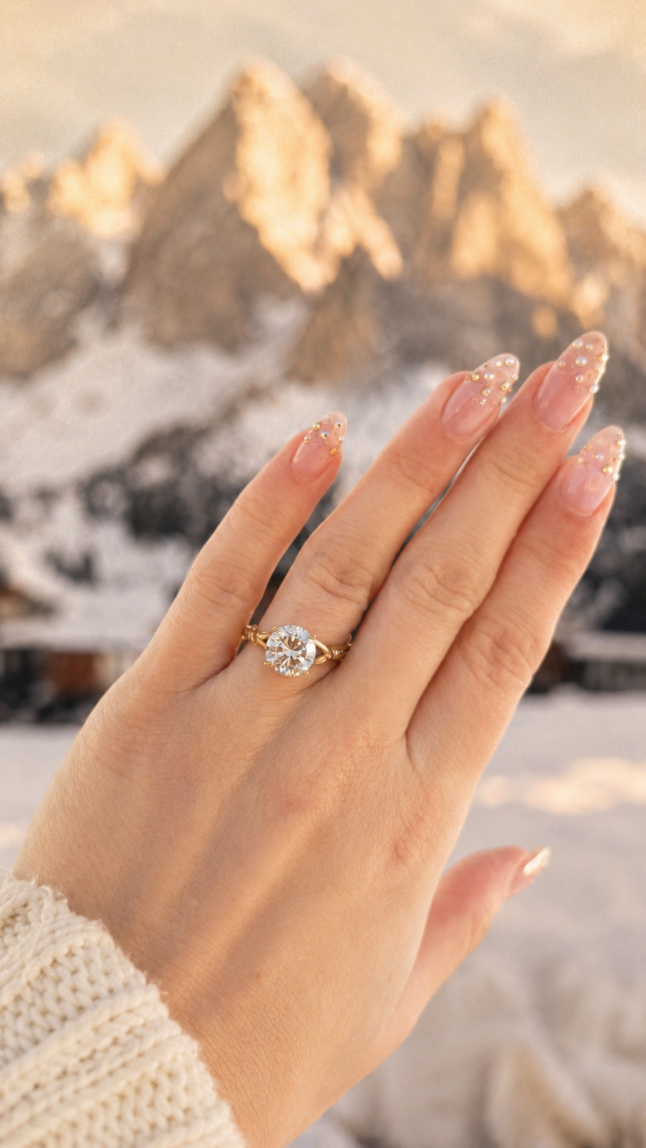Close-up of the engagement ring against the Dolomite mountains